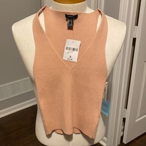 Nude, sleeveless sweater top